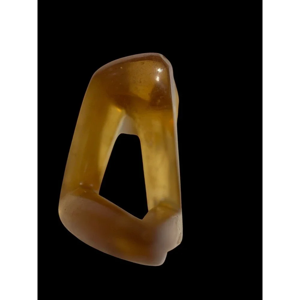 Faceless Lying Down Minimalistic Modern Art StatueYellow Lucite Resin